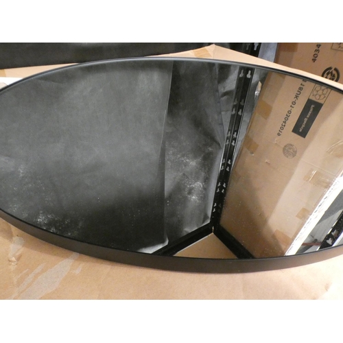 3170 - A circular black framed wall mirror * this lot is subject to VAT