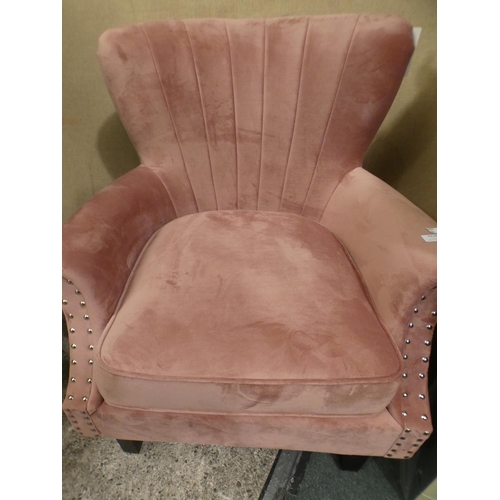 3228 - A blush pink velvet studded armchair * this lot is subject to VAT