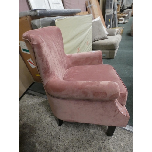 3228 - A blush pink velvet studded armchair * this lot is subject to VAT