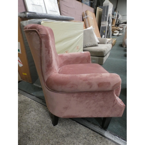 3228 - A blush pink velvet studded armchair * this lot is subject to VAT