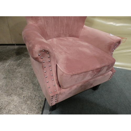 3228 - A blush pink velvet studded armchair * this lot is subject to VAT