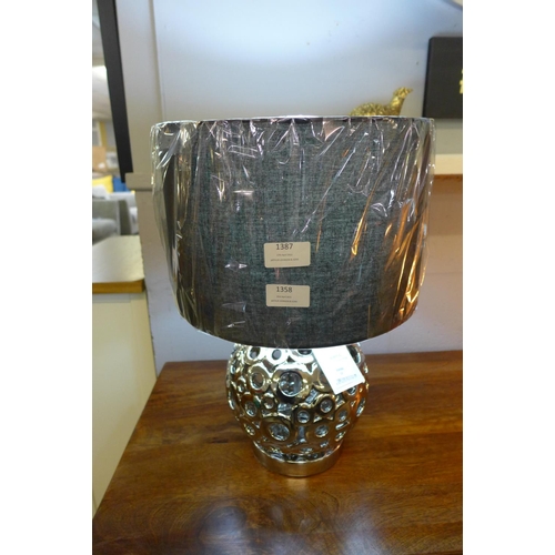 1464 - A Phillipa silver cut out globe lamp with black shade, 47cms (30651C33)