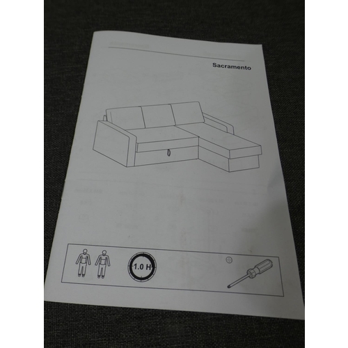 3149 - A charcoal fabric upholstered L-shaped sofa * this lot is subject to VAT