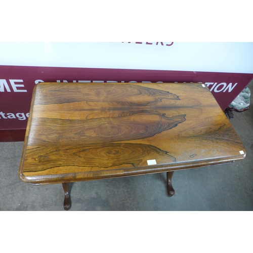 1 - A Victorian rosewood stretcher table