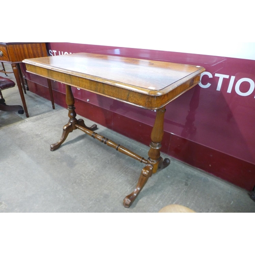 1 - A Victorian rosewood stretcher table