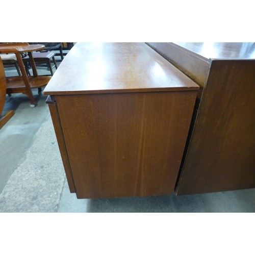 100 - A Beautility teak bow front sideboard