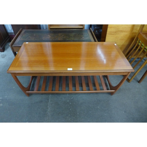 111 - A teak coffee table