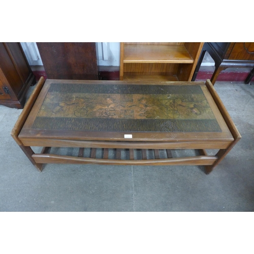 113c - A teak and copper topped Egyptian Revival coffee table