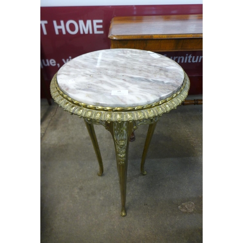 19 - A French Louis XV style ormolu and marble topped circular gueridon