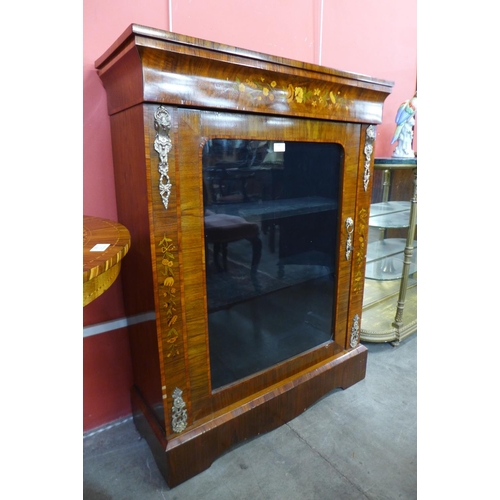 29 - A Victorian style marquetry inlaid walnut and gilt metal mounted pier cabinet