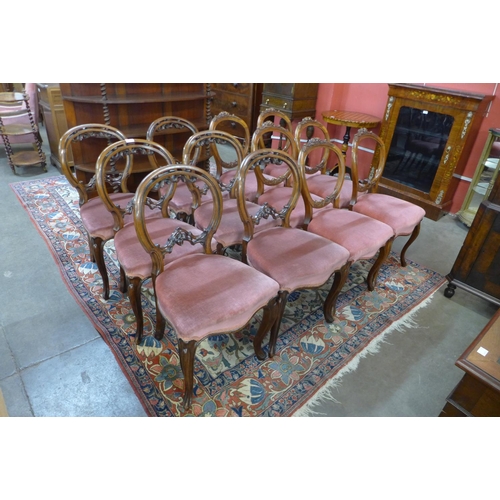 39 - A Harlequin set of twelve Victorian walnut balloon back dining chairs (6+6)