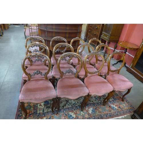 39 - A Harlequin set of twelve Victorian walnut balloon back dining chairs (6+6)