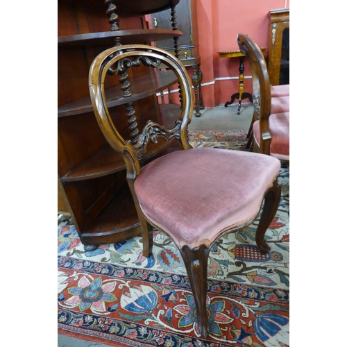 39 - A Harlequin set of twelve Victorian walnut balloon back dining chairs (6+6)