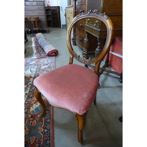 39 - A Harlequin set of twelve Victorian walnut balloon back dining chairs (6+6)