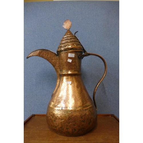 393 - A large North African copper ewer