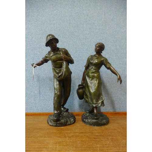 394 - After Antoine Bofill, pair of patinated spelter figures of two farm hands, girl a/f (arm repaired)