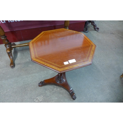 4 - A George IV inlaid mahogany octagonal lamp table