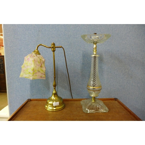 404 - A brass and coloured glass table lamp and a glass smokers stand