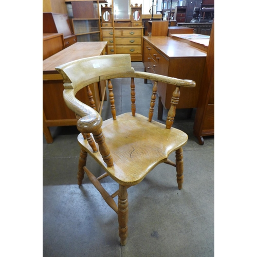 6 - A Victorian elm smokers bow chair