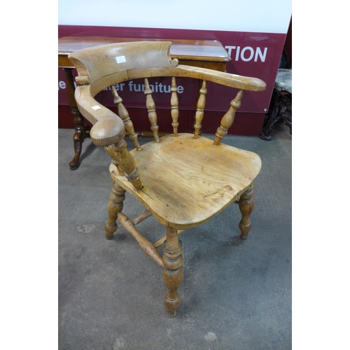 7 - A Victorian elm smokers bow chair