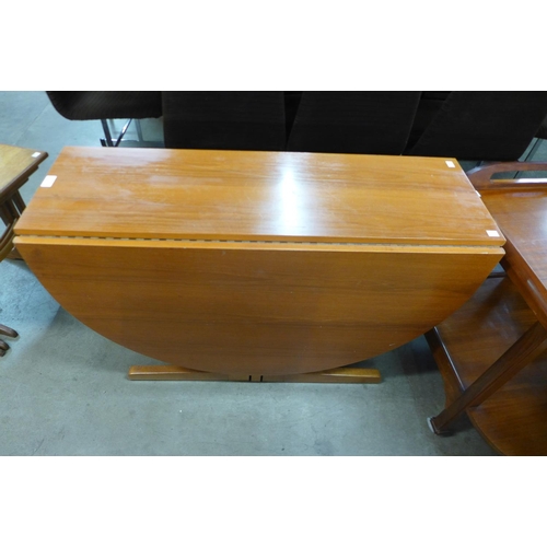 98 - A teak drop-leaf table