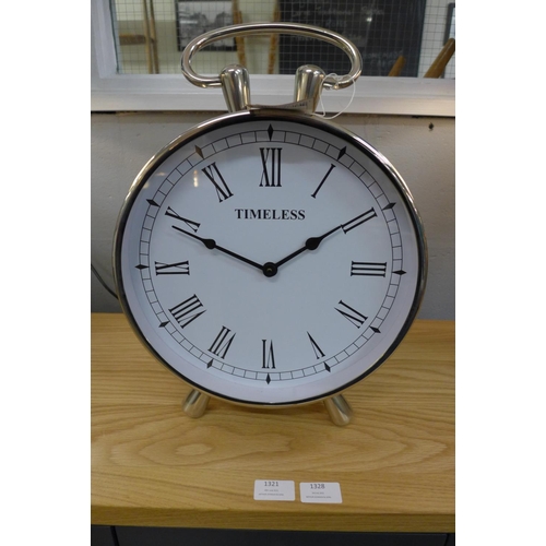 1331 - A circular chrome table clock with loop handle (1754225)   #