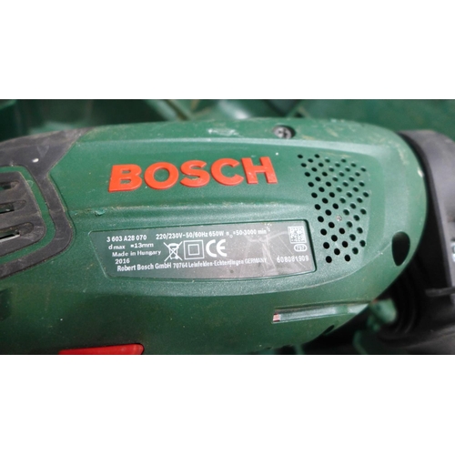 2051 - Bosch PSB65ORE 240v drill in case