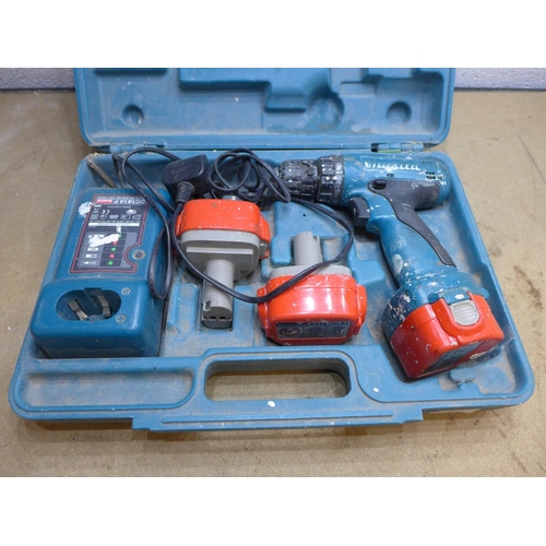 2057 - Makita cordless drill, 3 batteries & charger