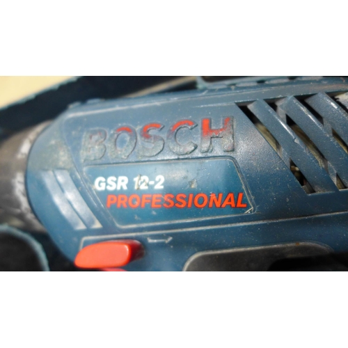 2058 - Bosch cordless drill, 4 batteries & charger GSR 12-2 - W