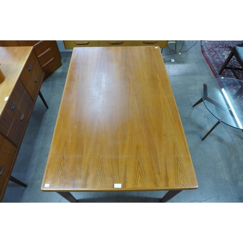 596 - A Danish A.M. teak extending dining table