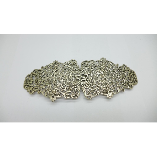 1299 - A large Victorian silver nurse's buckle, London 1893, 118g, 18cm