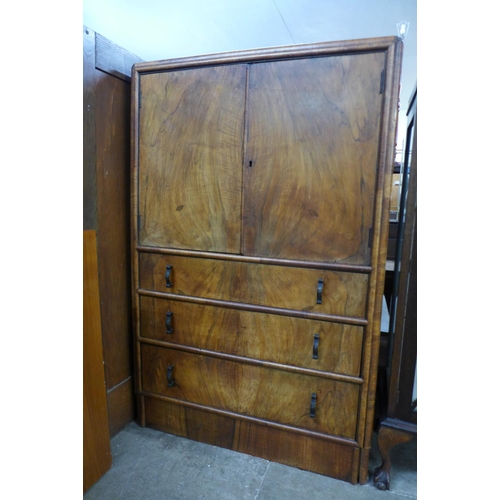 101 - An Art Deco walnut tallboy