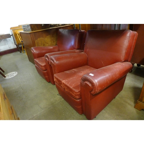 176 - A pair of Art Deco red leather armchairs