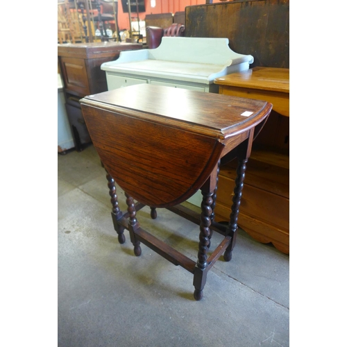 200 - A small oak barleytwist gateleg table