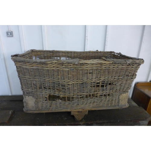 224 - A large wicker industrial factory trolley