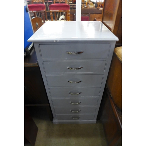 231 - A painted pine seven drawer chest