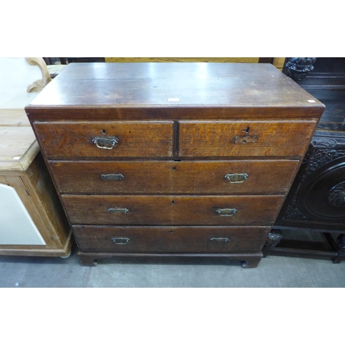 155 - A George III oak chest of drawers