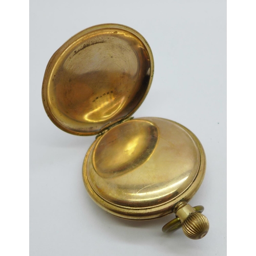 1012 - A gold plated pocket watch, lacking glass, case worn