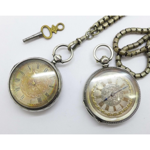 1018 - Two silver fob watches including one by Benson, glass a/f, and a guard chain