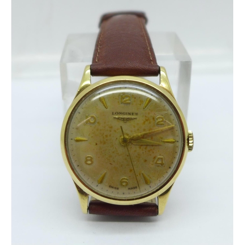 1022 - A 9ct gold cased gentleman's Longines wristwatch with original box, the case back with inscription, ... 