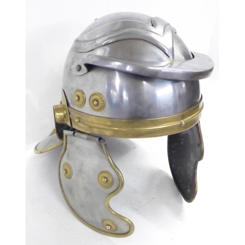 1044 - A small replica Roman Centurian helmet