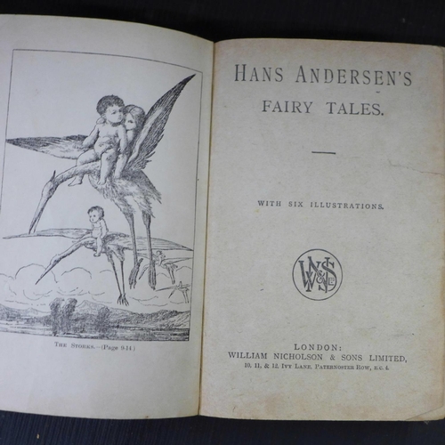 1064 - Books including three Holy Bibles, three albums of Charles Dickens and Hans Christian Anderson's Fai... 