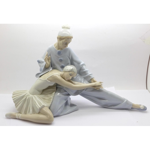 607 - A large Lladro porcelain figure group, ‘Closing Scene’, (ref 4935), ballerina and a pierrot, designe... 