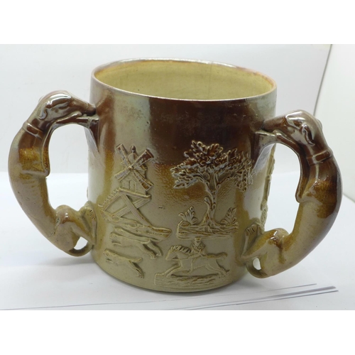 618 - A salt glaze three handled hunting mug, 16cm, a/f (cracked)