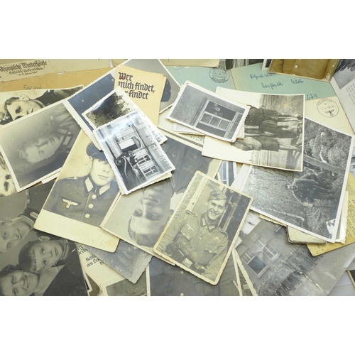 638 - Twenty-six WWII German photographs and twenty-five postcards, six letters and two Osterkommunion car... 