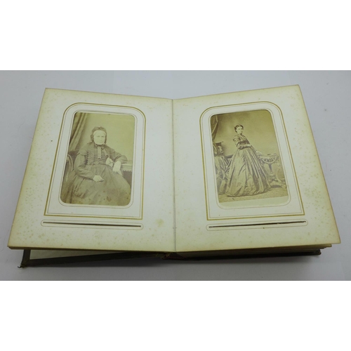 652 - A Victorian carte de visite photograph album, (42)