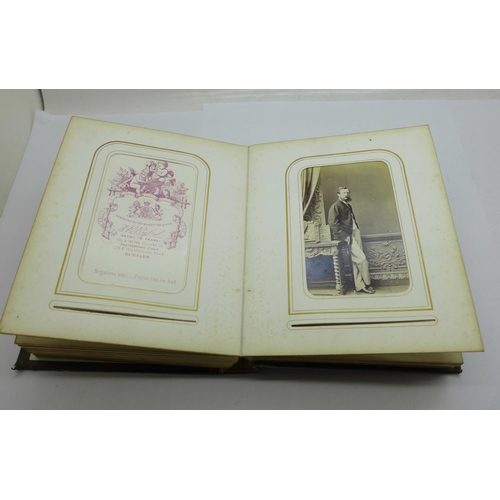 652 - A Victorian carte de visite photograph album, (42)