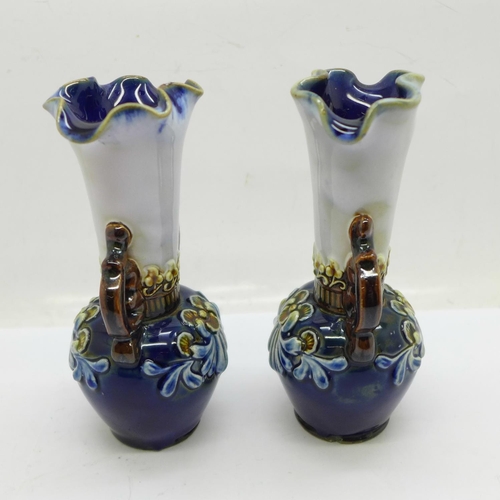 660 - A pair of small Royal Doulton vases, both with small chips to the base, 12.5cm