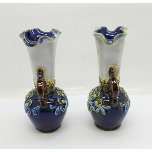 660 - A pair of small Royal Doulton vases, both with small chips to the base, 12.5cm