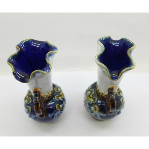 660 - A pair of small Royal Doulton vases, both with small chips to the base, 12.5cm